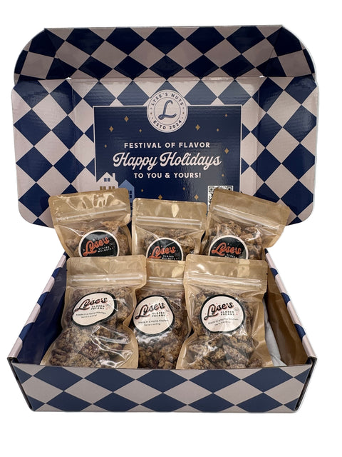 Open gift box with checkered design containing small packages labeled 'Lyse's'.