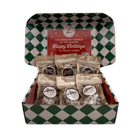 Packaged snacks in a green and white checkered box with a visible brand logo.