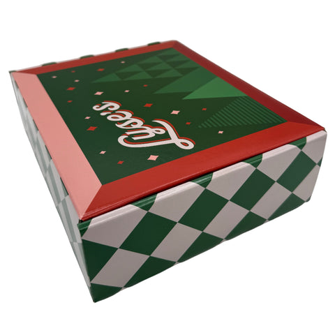 Hexagonal box with green and red design on a white background