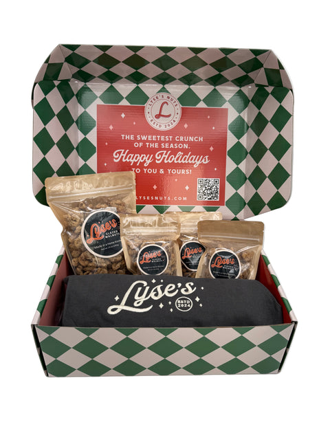 Holiday Gift box with Lyse's glazed nuts and apron on a white background
